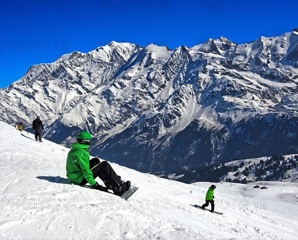 Snowboarder at Les Contamines-Montjoie ski resort