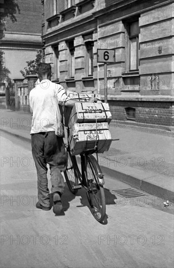 Cyclist with care packages