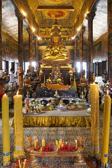 Gilt Bronze Buddha with offerings