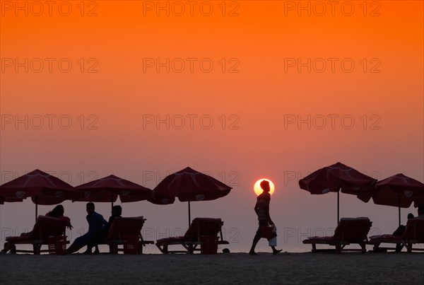 Silhouette of seller of tea on the beach in Cox's Bazar