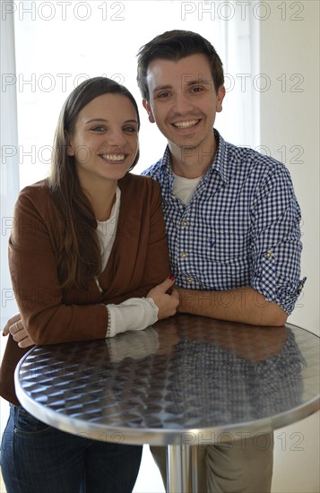 Young couple at a bar table