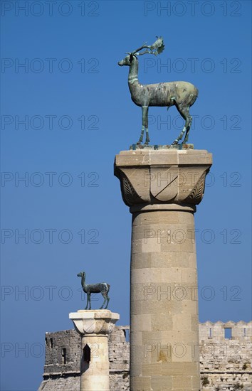 Columns with a stag and a doe
