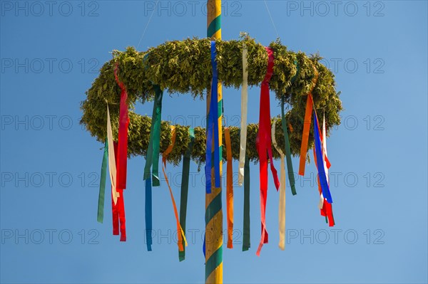 Maypole with colorful ribbons