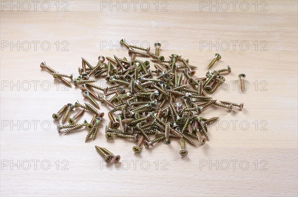 Wood screws on a wooden table