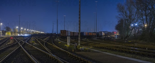 Storage tracks with freight trains in the evening
