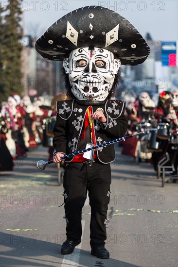 Master drummer dressed as Mexican at Mattli-Zunft carnival procession