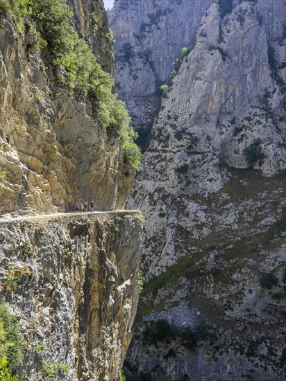 Hiking trail on a rock-cliff through the Cares Gorge