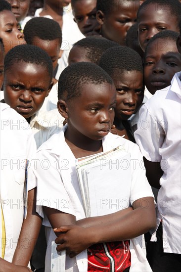 Group of students in schoolyard during morning assembly