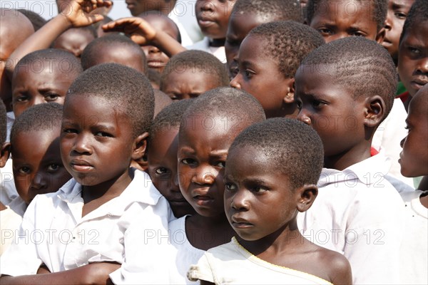 Group of students in schoolyard during morning assembly