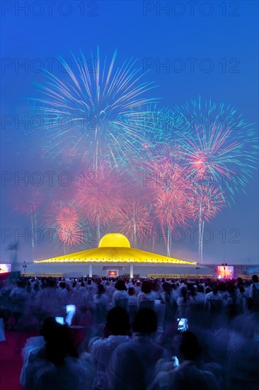 Fireworks behind the Chedi Mahadhammakaya Cetiya of the Wat Phra Dhammakaya temple