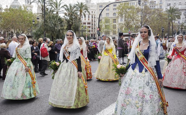Women in traditional dress during procession at the festival of San Vicente Ferrer
