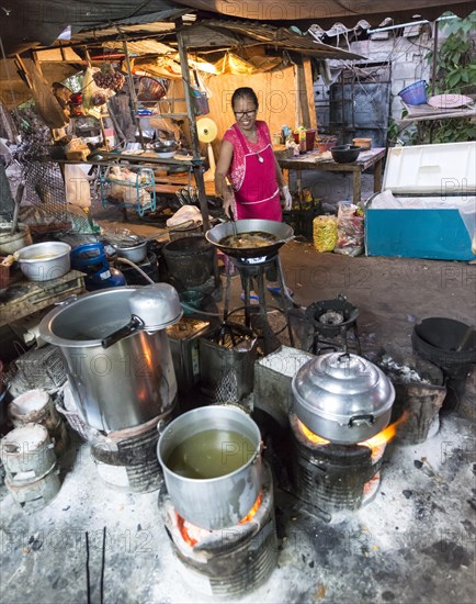 Thai woman preparing food