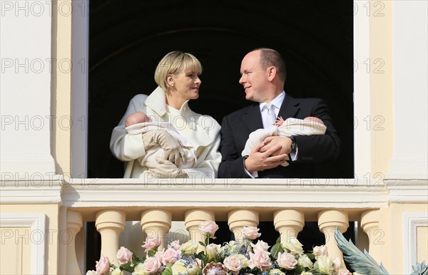 Princess Charlene and Prince Albert II of Monaco presenting their twins Prince Jacques and Princess Gabrielle at the palace window to the public for the first time