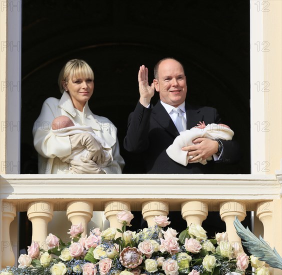 Princess Charlene and Prince Albert II of Monaco presenting their twins Prince Jacques and Princess Gabrielle at the palace window to the public for the first time