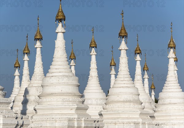 White stupas of Sandamuni or Sanda Muni Pagoda