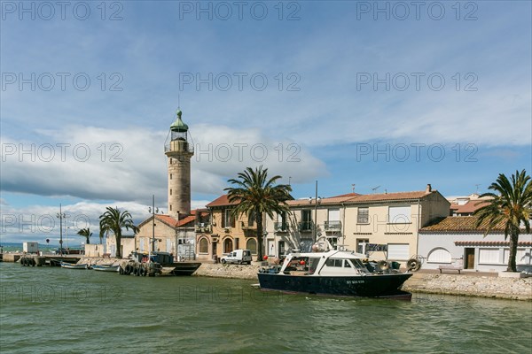 Lighthouse on the banks of a canal