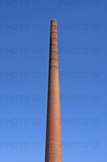 Old brick factory chimney