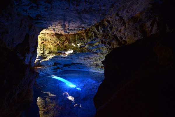 Poco Encantado cave with light beams