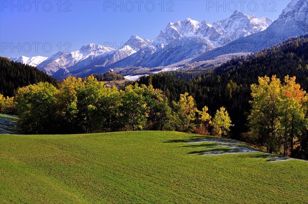 Lower Engadine in autumn with snowy mountains