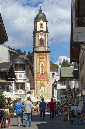 Bell tower of the parish church of St. Peter and Paul with Luftlmalerei