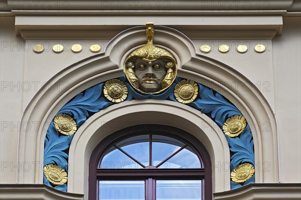 Decorative element above a window