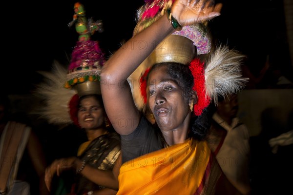 Woman dressed as Ammankudam