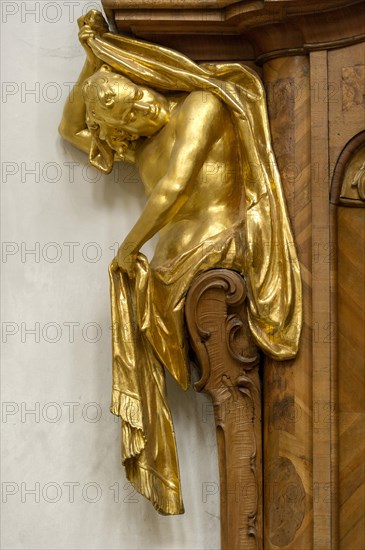 Atlas figure at the confessional