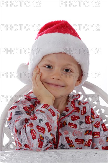 Child wearing a Santa Claus hat