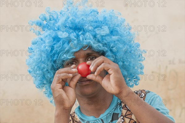 Member of a carnival club in the slums of Ribeira Bote