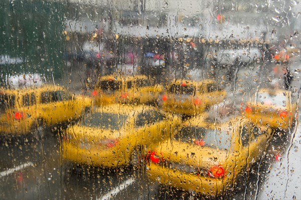 Taxis in the rain