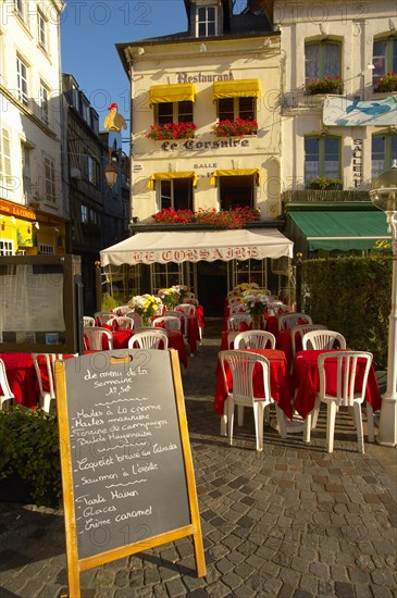 Le Corsaire restaurant with terrace tables set ready for lunch