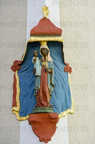 Black Madonna on a house