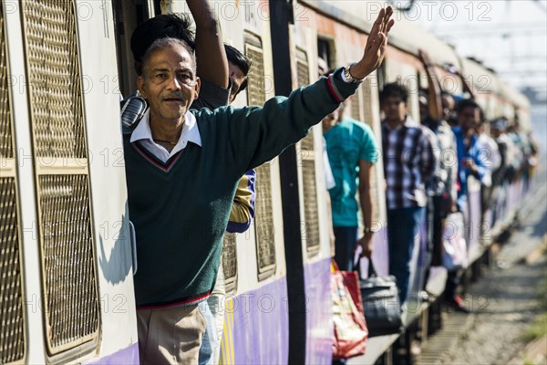 Crowded train arriving at Churchgate Railway Station