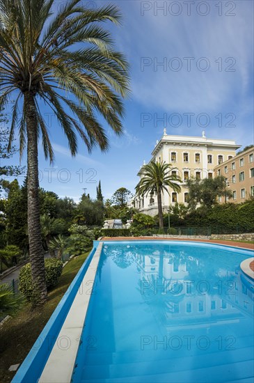 Swimming pool in front of villa