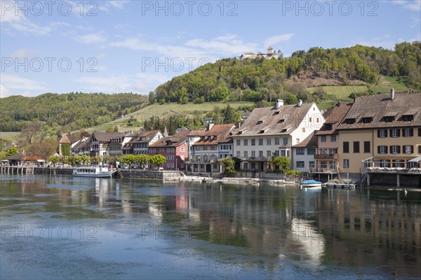 Bank of the Rhine River with a boat landing and Burg Hohenklingen Castle