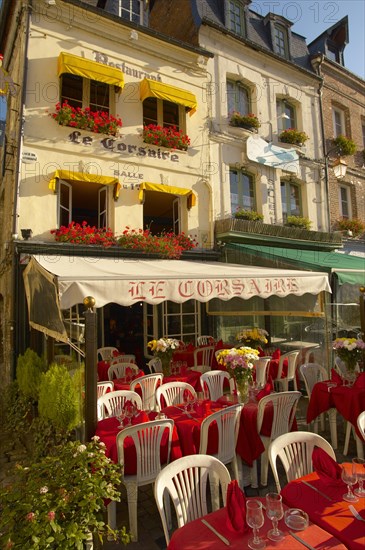 Le Corsaire restaurant with terrace tables set ready for lunch