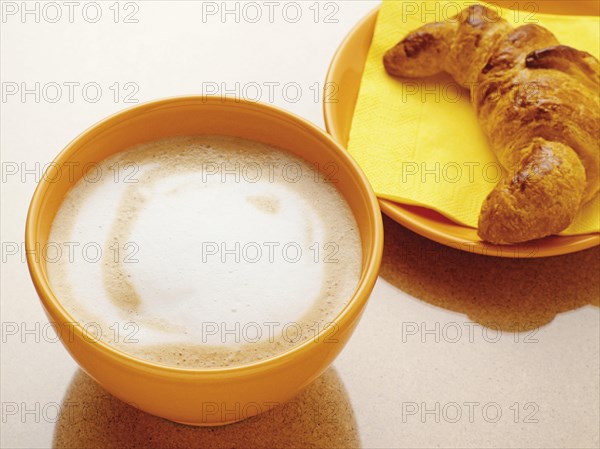 Latte with a croissant