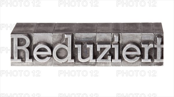 Old lead letters forming the word 'Reduziert'