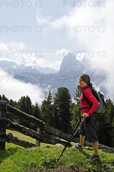 Hiker standing on the Raschoetz alp