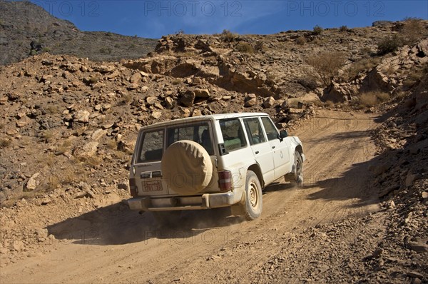 All-terrain vehicle on a dirt slope