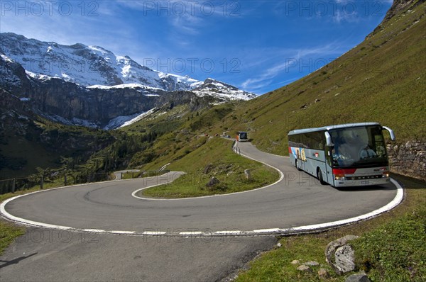 Coach in a hairpin curve