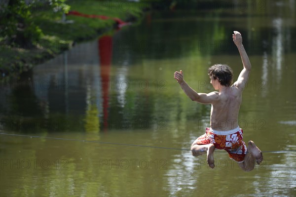 Boy balancing on a slackline