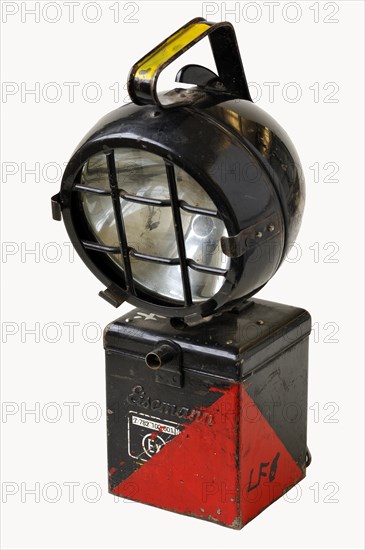 Flashlight with a battery compartment from the fire department