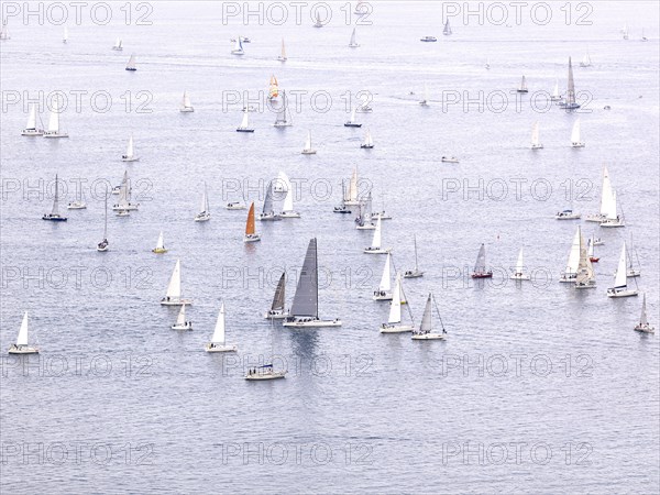 Sailing boats taking part in a historical sailing regatta