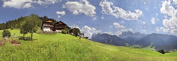 Alpine farms and green pastures in Villnoess Valley