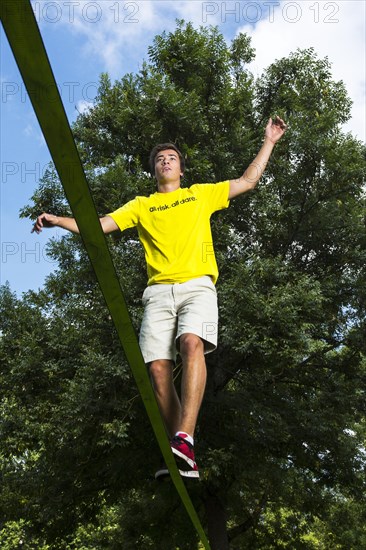 Athlete balancing on a slackline