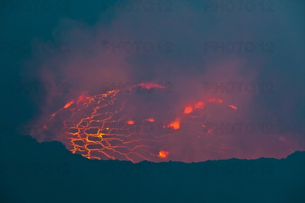 Boiling lava lake in the crater of Mount Nyiragongo volcano