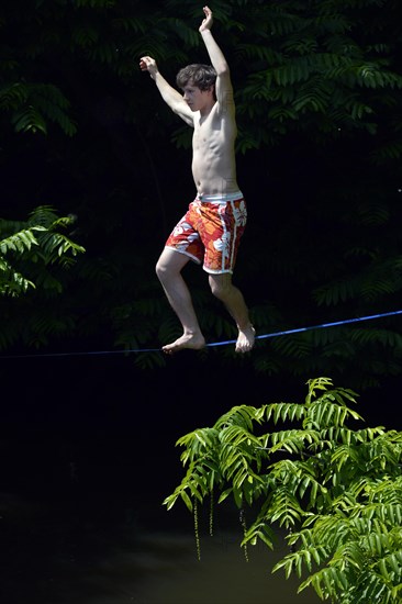 Boy balancing on a slackline