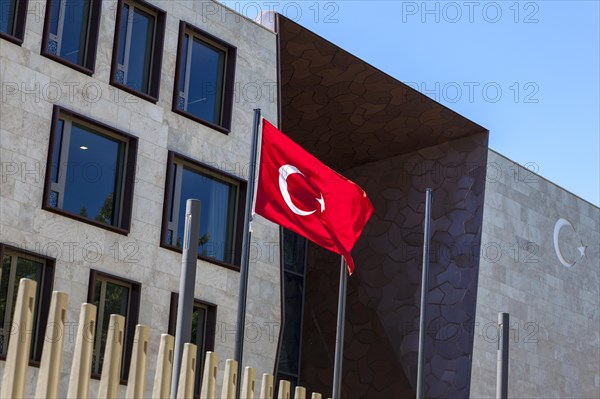 Turkish flag in front of the entrance to the Turkish Embassy