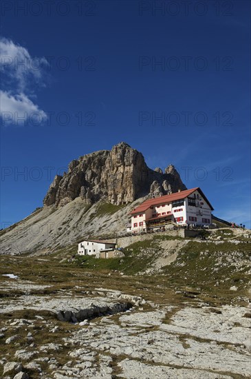 Dreizinnenhuette or Three Peaks Alpine hut with Toblinger Knoten Mountain